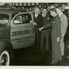 Ford - Ford, Edsel - Showing 28 millionth Ford car to A. Harry Moore, Santiago Suarez, Douglas S. Cole and crowd