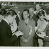 Ford - Ford, Edsel - Being interviewed by newspapermen