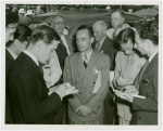 Ford - Ford, Edsel - Being interviewed by newspapermen