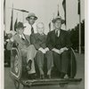 Ford - Ford, Henry - In American Express pushcart with Rex Ryan and Frank Campsall