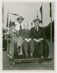 Ford - Ford, Henry - In American Express pushcart with Rex Ryan and Frank Campsall