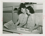 France Participation - Cigarette girls reading newspaper announcing war