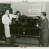 France Participation - Men examining Radio Belinographe machine