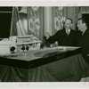 France Participation - Building - Count René Doynel de Saint Quentin and Grover Whalen examining model