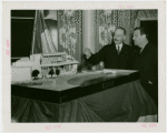 France Participation - Building - Count René Doynel de Saint Quentin and Grover Whalen examining model