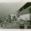 France Participation - Building - Construction - Workers applying plaster to walls