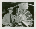 France Participation - Veterans - French veteran examining Air France engine