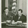 German Consul General, Johannes Borchers, signing contract with Grover Whalen