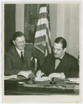 German Consul General, Johannes Borchers, signing contract with Grover Whalen