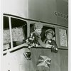 Man and woman in Good Year bus