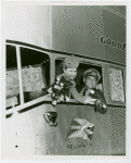 Man and woman in Good Year bus