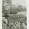 Gardens on Parade - Woman holding flowers on footbridge