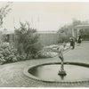 Gardens on Parade - Man and woman examining flowers