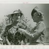 Gardens on Parade - Mother pinning blue ribbon on daughter
