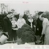 Gardens on Parade - Grover Whalen with pageant members at presentation of boxwood plant from Mary Washington's garden