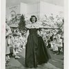 Gardens on Parade - Woman in evening dress walking for crowd of onlookers