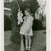 Gardens on Parade - Girl looking at flower
