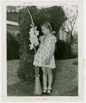 Gardens on Parade - Girl looking at flower