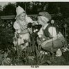 Gardens on Parade - Girl and boy in Dutch costume with tulips