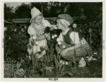 Gardens on Parade - Girl and boy in Dutch costume with tulips