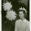 Gardens on Parade - Woman with dahlia blooms