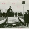 Gas Industries - Man speaking at groundbreaking with Grover Whalen listening