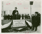 Gas Industries - Man speaking at groundbreaking with Grover Whalen listening