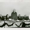 General Cigar Co. Participation - Man giving speech at luncheon with Grover Whalen, a white owl, and others