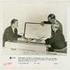 General Electric - Grover Whalen and Owen D. Young looking at map showing coverage of shortwave radio