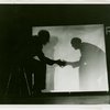 General Electric - Man shaking hands with own shadow at House of Magic
