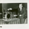 General Electric - Man demonstrating solar power at House of Magic