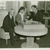 General Electric - Grover Whalen looking at model with man and woman