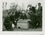 General Electric - Grover Whalen and group of officials with model