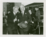 General Electric - Alfred Smith laughing with man