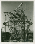 General Electric - Building - Workers constructing gyroscopic sphere for lightning bolt sculpture
