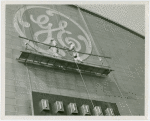 General Electric - Building - Workers painting logo