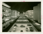 General Motors - Building - Interior concourse with cars at night