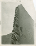 General Motors - Building - Man working on sign