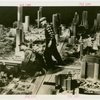 General Motors - Futurama - Artists standing among models of buildings