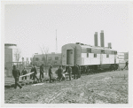 General Motors - Train - Workers laying down temporary tracks