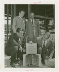 Glass Center - Grover Whalen and officials with glass block for cornerstone