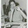 Glass Center - Glassblowing - Woman blowing glass