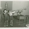 Glass Center - Glassblowing - Boy and girl blowing glass