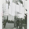 Great Britain Participation - Sir Louis Beale and other men under flags