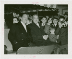 Great Britain Participation - Grover Whalen and other official in cart surrounded by others