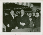 Great Britain Participation - Grover Whalen and other official in cart surrounded by others