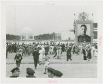 Great Britain Participation - King and Queen - Crowd in front of giant portrait of King George