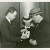 Great Britain Participation - Stamp Exhibit - Ann Hind Scala, Grover Whalen and man with rare magenta British Guiana stamp
