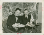 Greece Participation - Grover Whalen signing contract with Nicholas Tserepis (Consul General)
