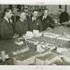 Greece Participation - Nicholas Tserepis (Consul General) and officials looking at Fair model